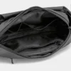 The Aviemore - The Aviemore nylon bum bag in black, open to show the inside The Aviemore nylon bum bag in black, open to show the inside