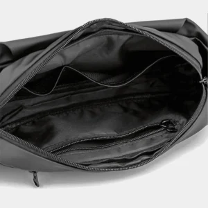 The Aviemore nylon bum bag in black, open to show the inside