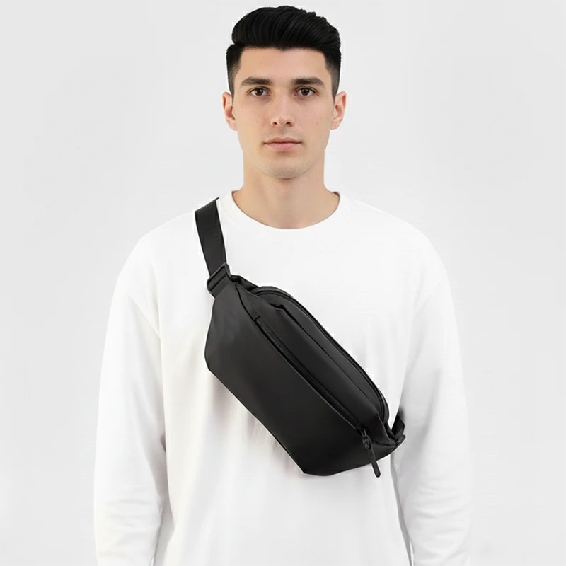The Aviemore nylon bum bag in black, worn across the body