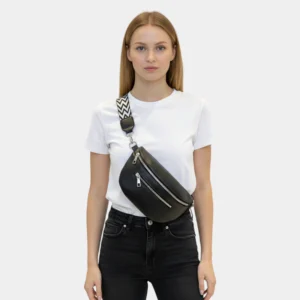The Bibury faux leather bum bag in black, worn across the body