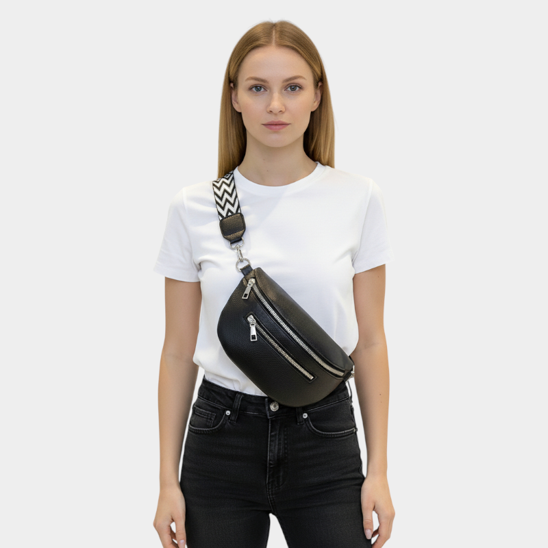 The Bibury faux leather bum bag in black, worn across the body