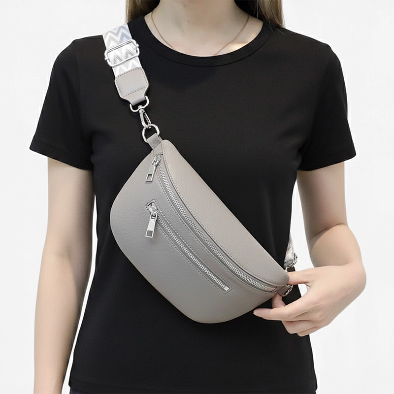 The Bibury faux leather bum bag in grey, worn across the body