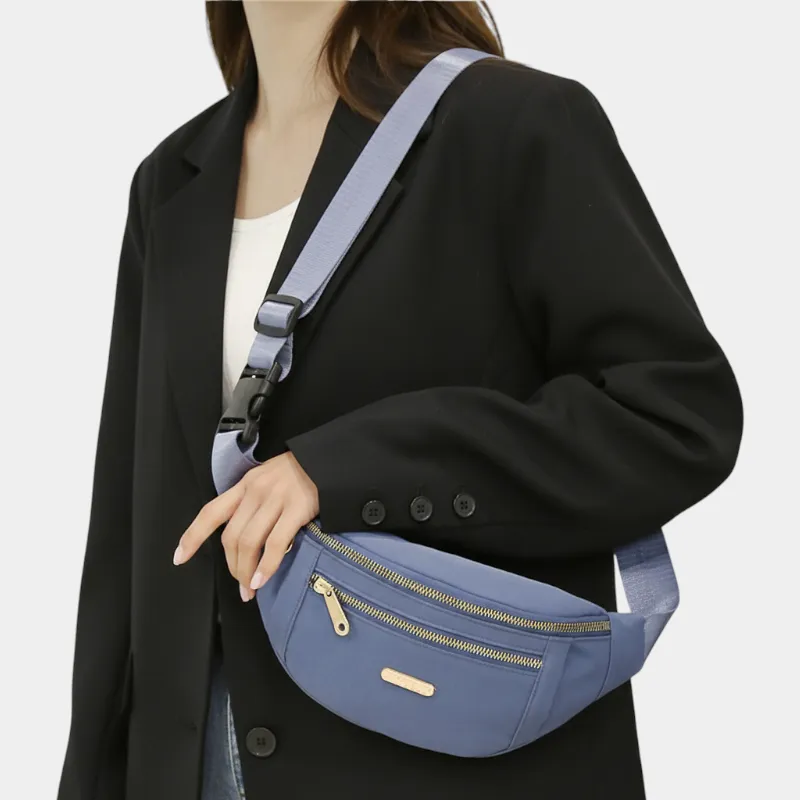 The Grasmere bum bag in blue, open to show the inside