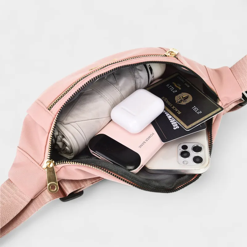 The Grasmere - The Grasmere bum bag in pink, open to show the inside The Grasmere bum bag in pink, open to show the inside