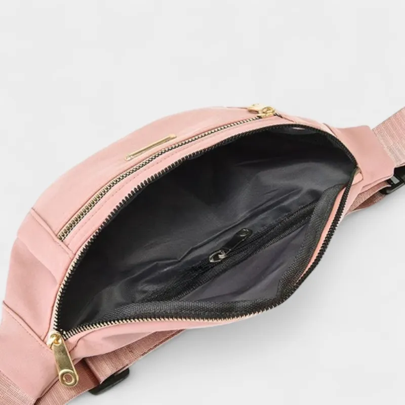 The Grasmere - The Grasmere bum bag in pink, open to show the inside The Grasmere bum bag in pink, open to show the inside