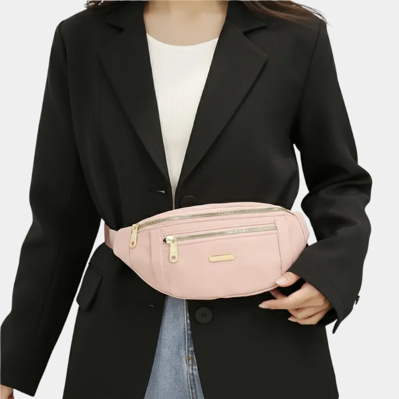 The Grasmere - The Grasmere bum bag in pink, worn round the waist The Grasmere bum bag in pink, worn round the waist