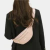 The Grasmere - The Grasmere bum bag in pink, worn across the body The Grasmere bum bag in pink, worn across the body