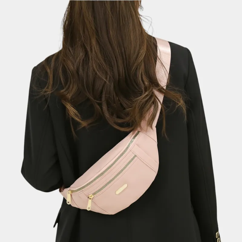 The Grasmere - The Grasmere bum bag in pink, worn across the body The Grasmere bum bag in pink, worn across the body