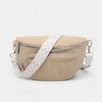The Ilkley corduroy bum bag in beige with its beige geometric-pattern strap, front view