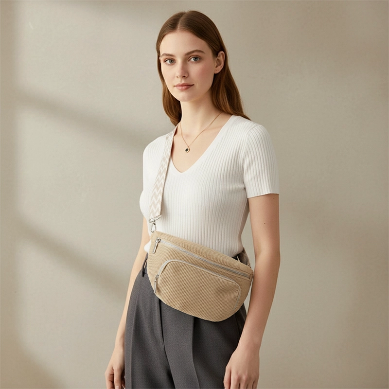 Woman wearing the beige Ilkley corduroy bum bag across the body