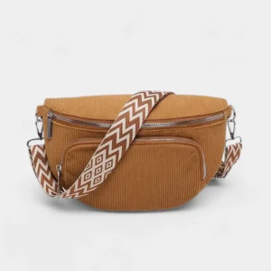 The Ilkley corduroy bum bag in brown with its geometric-pattern strap, front view