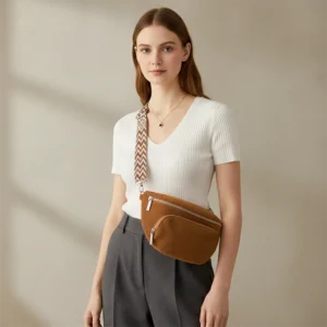 Woman wearing the brown Ilkley corduroy bum bag across the body