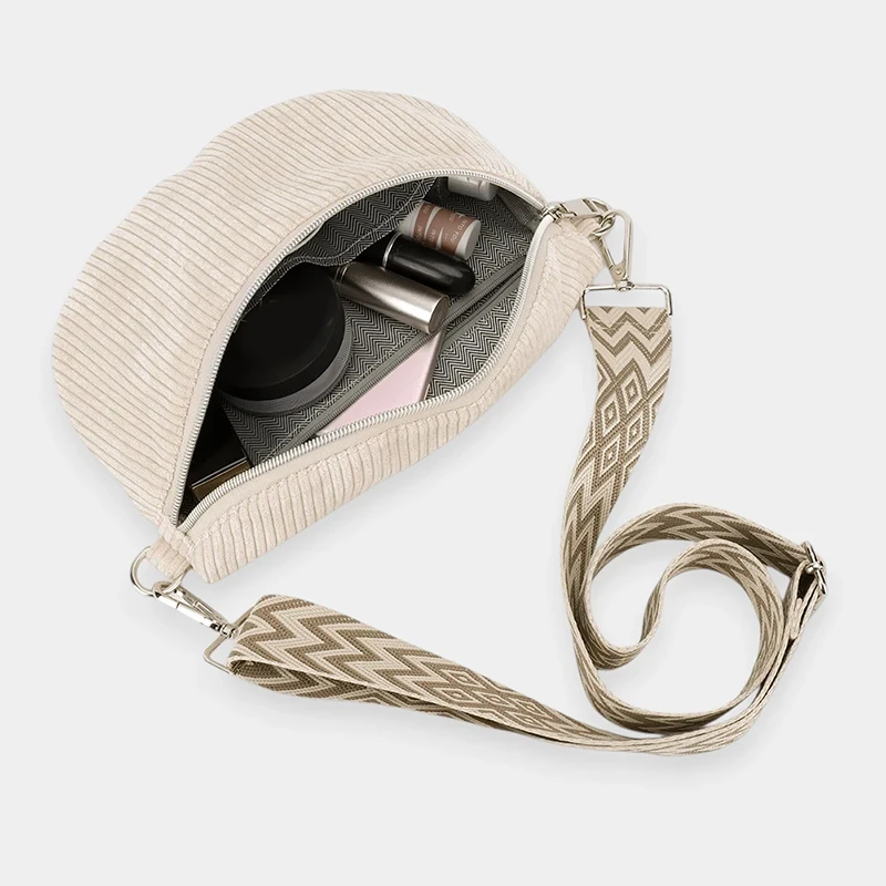The Malton - The Malton corduroy bum bag in beige, open to show the inside The Malton corduroy bum bag in beige, open to show the inside
