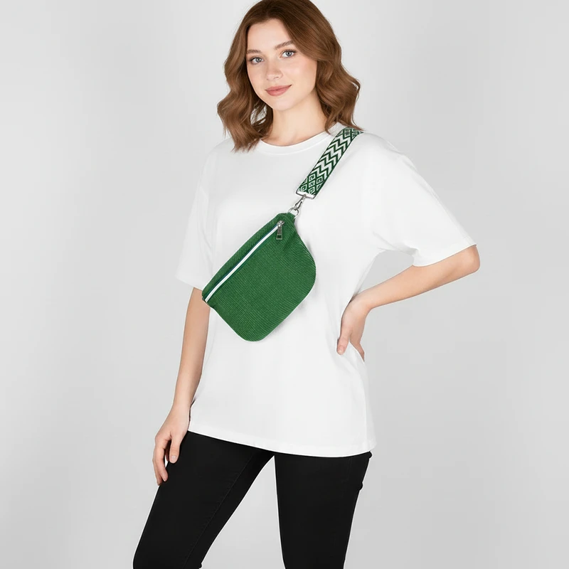 The Malton corduroy bum bag in green, worn across the body