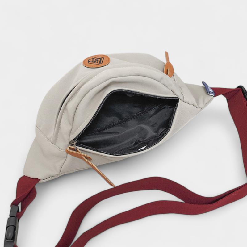 The Padstow - The Padstow two-tone belt bag in beige, open to show the inside The Padstow two-tone belt bag in beige, open to show the inside