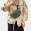 The Skipton corduroy bum bag in green, worn across the body