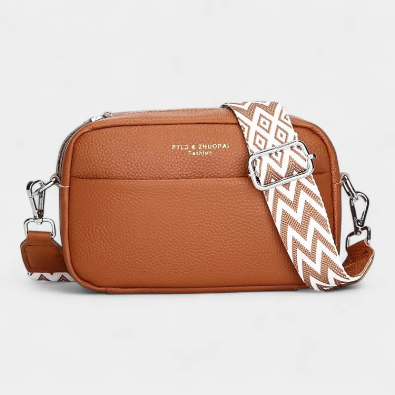 The Tetbury leather crossbody bag in brown, front view