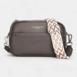 The Tetbury leather crossbody bag in grey, front view