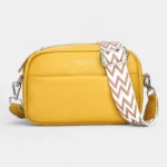 The Tetbury leather crossbody bag in yellow, side view